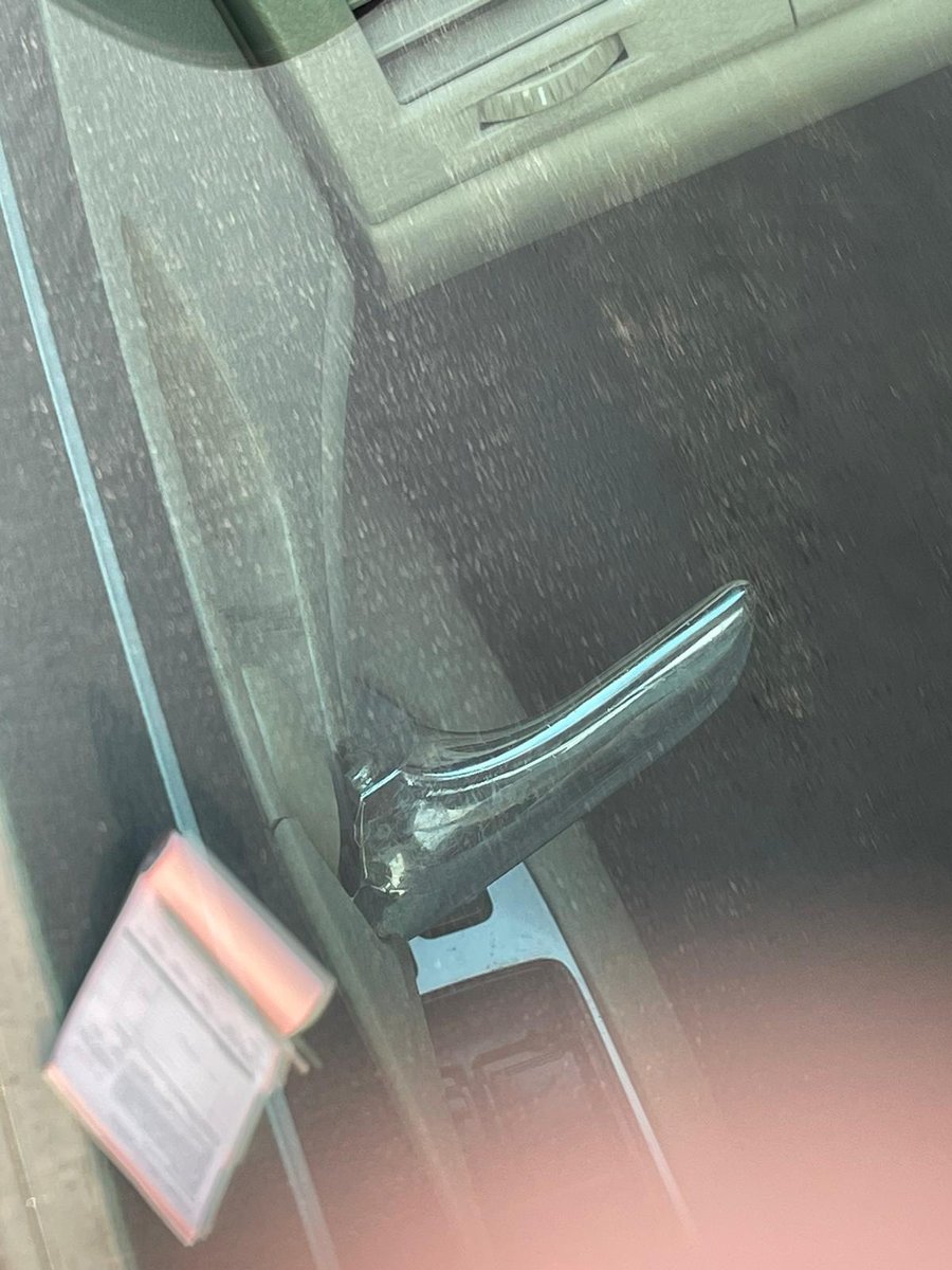 Reaching a car door handle during a vehicle lockout