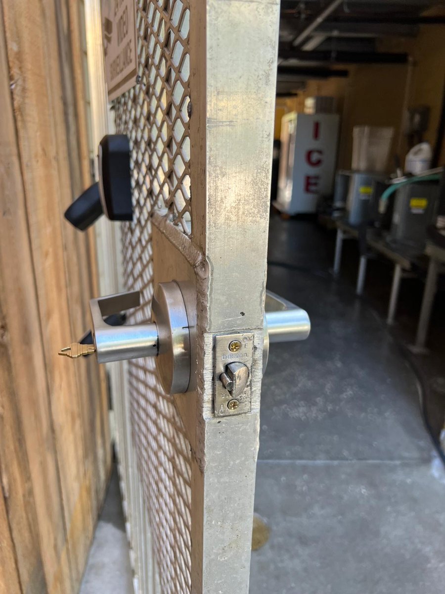 Gate lever and deadbolt keyed alike with keys in both locks