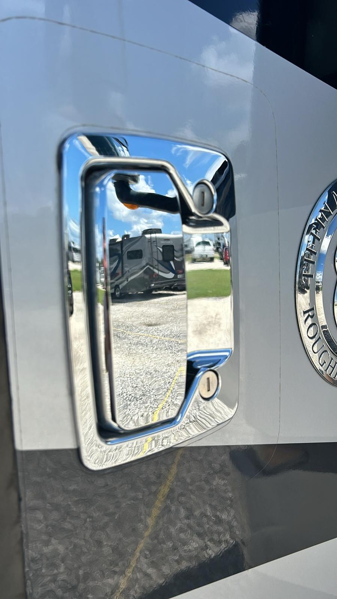 Chrome entry handle on an RV door