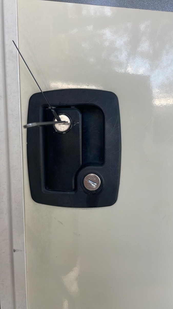 Picking open an RV trailer paddle latch